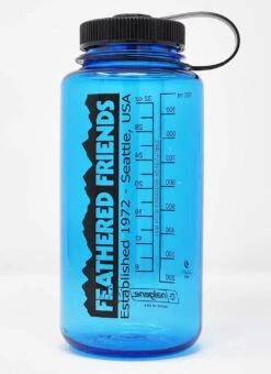 Feathered Friends Nalgene 1L Water Bottle 13 Feathered Friends Nalgene 1L Water Bottle -Feathered Friends Shop feathered friends nalgene logo slate blue